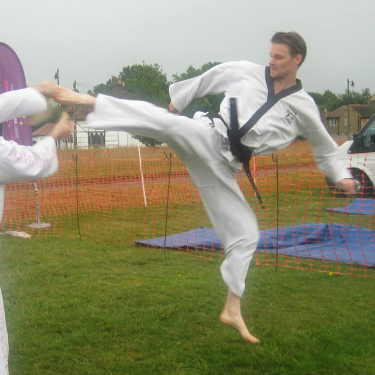 Darren Welch performing jumping reverse turning kick