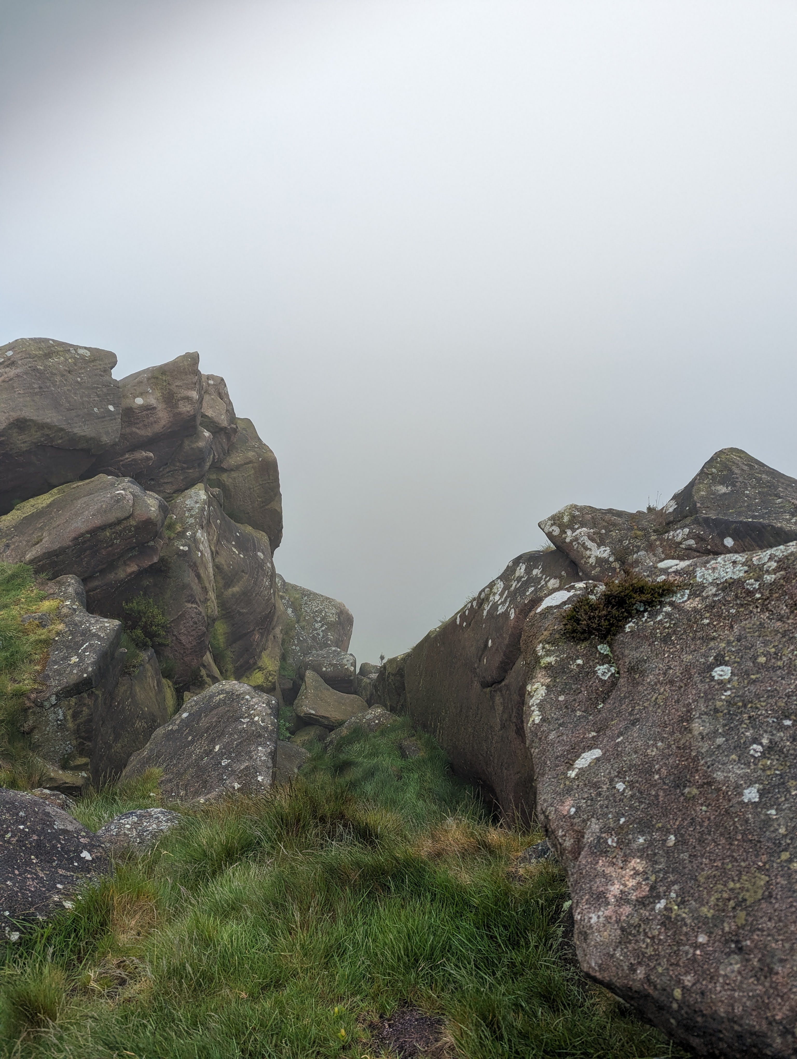 rocks surrounded by fog